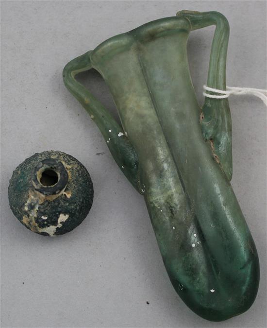 Two Roman green glass vessels, c.2nd century AD, 12cm